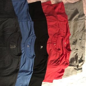 Seven (7) Starter T-Shirts